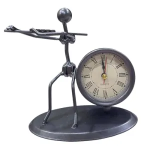 Rudra Kriti | Iron Figurine Table Clock - Minimalist Decor Clock with Flute Player Figurine - Unique Art Piece with Roman Numeral Face - 6.3 Inches Tall